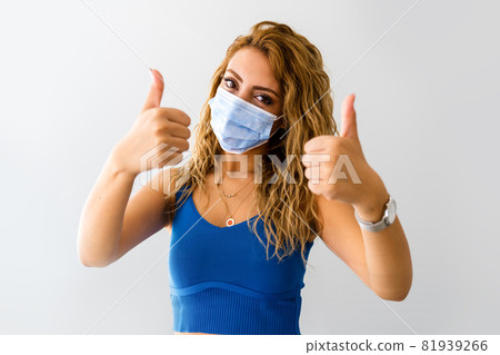 Young woman with a medical mask, protection and precaution for contagious disease. Corona virus outbreaking. 81939266