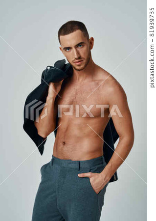 man in black leather jacket topless posing modern style self-confidence 81939735