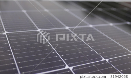 Photovoltaic solar panel extreme close up. Close-up of modern photovoltaic solar battery panels. Rows of sustainable energy solar panels installed on terrace. Solar panels on roof top. Panels at home. Photovoltaic solar panel extreme close up. Close-up of modern photovoltaic solar battery panels. Rows of sustainable energy solar panels installed on terrace. Solar panels on roof top. Panels at home. 81942068