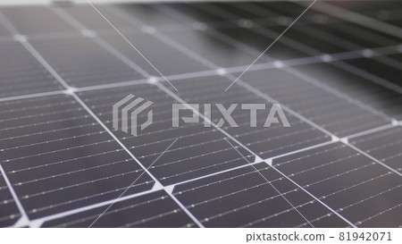 Photovoltaic solar panel extreme close up. Close-up of modern photovoltaic solar battery panels. Rows of sustainable energy solar panels installed on terrace. Solar panels on roof top. Panels at home. 81942071