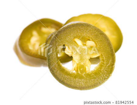 Pickled jalapeno pepper isolated on white background. Slices of preserved hot serrano. 81942554