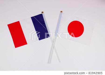 Flag of France and flag of Japan crossed with each other on a white background. Isolated. The image illustrates the relationship between countries. Photo for news and articles on the media Flag of France and flag of Japan crossed with each other on a white background. Isolated. The image illustrates the relationship between countries. Photo for news and articles on the media 81942905