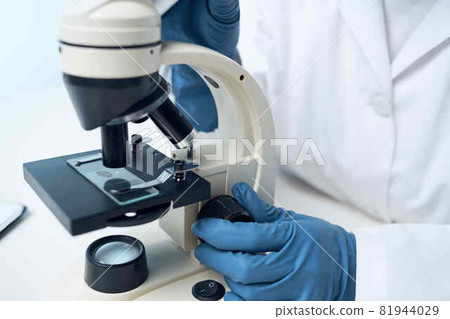 woman wearing medical mask laboratory microscope science research 81944029