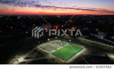 A group of people are playing on the playground. A group of people are playing on the playground. 81945468