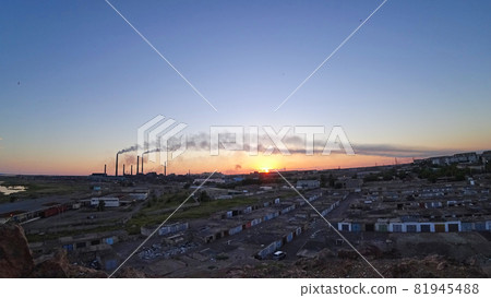 An epic sunset with a view of the smoke of factory An epic sunset with a view of the smoke of factory 81945488