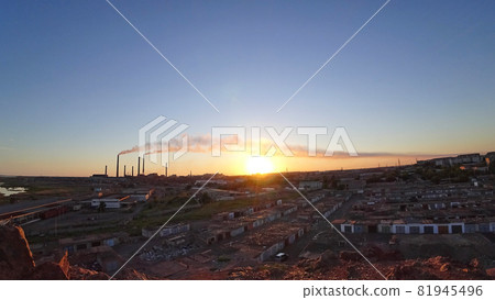An epic sunset with a view of the smoke of factory An epic sunset with a view of the smoke of factory 81945496