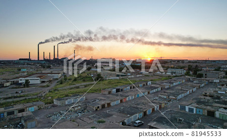 An epic sunset with a view of the smoking factory An epic sunset with a view of the smoking factory 81945533