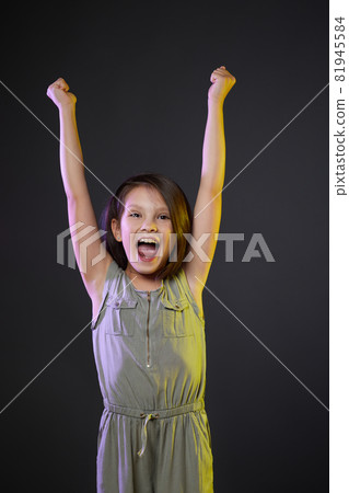 cute little child girl showing victory gesture cute little child girl showing victory gesture 81945584