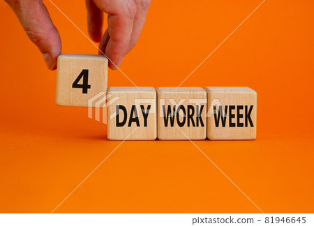 4 day work week symbol. Businessman holds the cube with words '4 day work week'. Beautiful orange background. Copy space. Business and 4 or 5 day work week concept. 4 day work week symbol. Businessman holds the cube with words '4 day work week'. Beautiful orange background. Copy space. Business and 4 or 5 day work week concept. 81946645