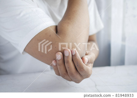 man with elbow pain, Pain relief concept. man with elbow pain, Pain relief concept. 81948933