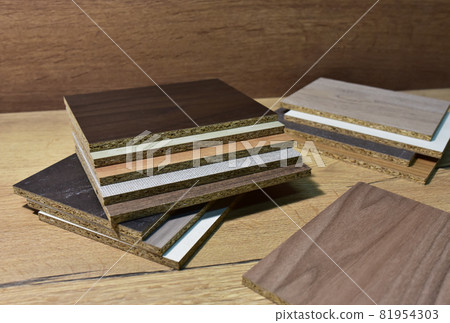 Samples of fibreboard panels with wood texture. Laminated CPD. Chipboard PVC edge. Wooden furniture  81954303
