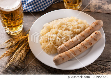 Bratwurst sausage ,sauerkraut, pretzels and beer Bratwurst sausage ,sauerkraut, pretzels and beer 81954839