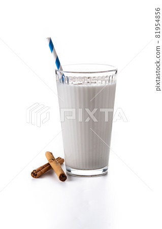 Fresh horchata with cinnamon in glass Fresh horchata with cinnamon in glass 81954856