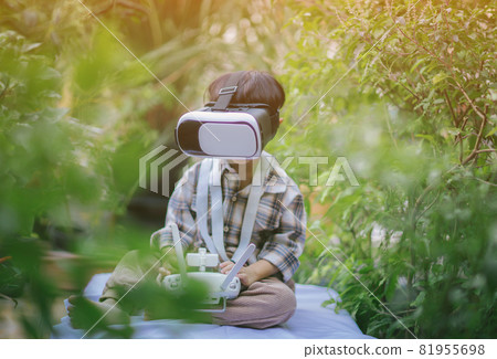 children in virtual reality glasses playing the game 81955698
