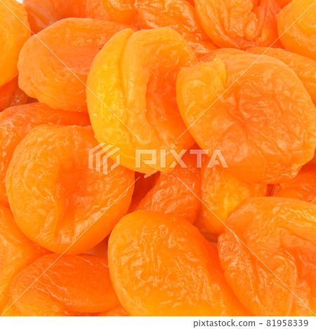 Heap of dried apricots close-up. 81958339