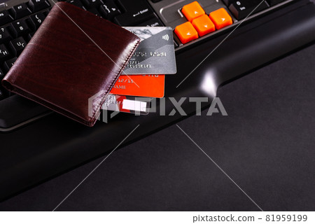 Conceptual view of on-line shopping with credit card,wallet and laptop 81959199