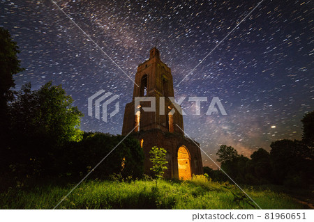 night bell tower ruin in forest at starry night with internal light 81960651