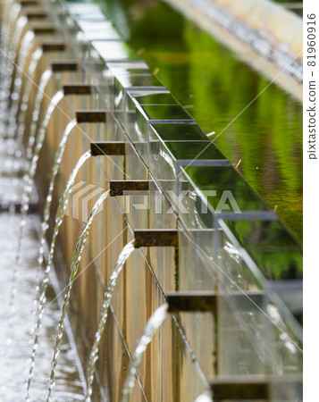 A beautiful waterway in a park where water flows A beautiful waterway in a park where water flows 81960916