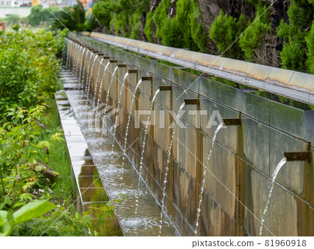A beautiful waterway in a park where water flows A beautiful waterway in a park where water flows 81960918