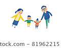 A family of four walking hand in hand 81962215