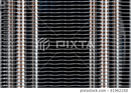 Abstract heat radiator closeup. Modern tower sink with heatpipes inside closeup macro shot with selective focus Abstract heat radiator closeup. Modern tower sink with heatpipes inside closeup macro shot with selective focus 81962288