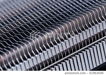modern large heat radiator unit closeup macro background with selective focus and diagonal composition 81962698