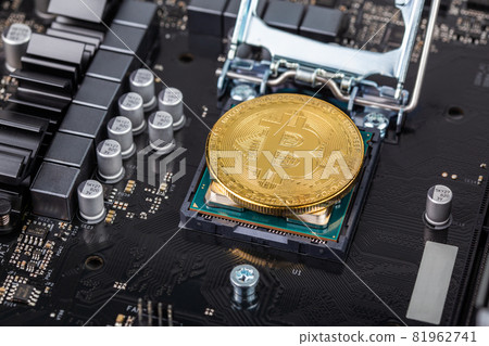 bitcoin physical shiner in cpu socket of modern cpu motherboard with selective focu and blur bitcoin physical shiner in cpu socket of modern cpu motherboard with selective focu and blur 81962741