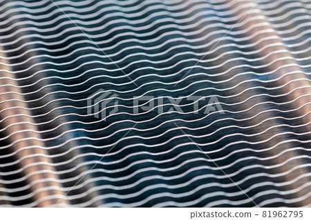 modern heat radiator closeup macro background with selective focus and diagonal composition 81962795