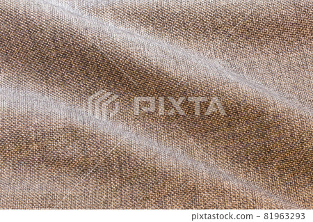 Brown waves dense rough fabric closeup background 81963293