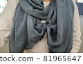woman wearing achromatic scarf 81965647