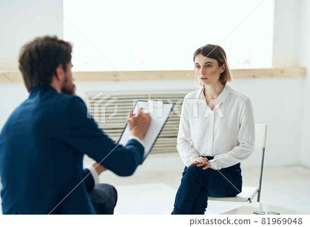 male psychologist communicates with a woman patient consultation lifestyle male psychologist communicates with a woman patient consultation lifestyle 81969048