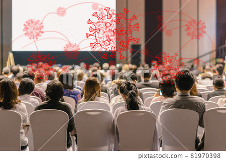 Coronavirus Network Outbreak over Rear view of Audience listening Speakers on the stage in the conference hall or seminar meeting, business and education take risk for covid19, social distance concept Coronavirus Network Outbreak over Rear view of Audience listening Speakers on the stage in the conference hall or seminar meeting, business and education take risk for covid19, social distance concept 81970398