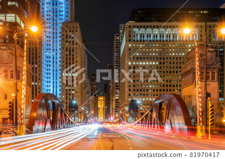 Scene of Chicago riverwalk cityscape at the twilight time, USA downtown skyline, illinois, United state of america, Architecture and building,travel with tourist concept Scene of Chicago riverwalk cityscape at the twilight time, USA downtown skyline, illinois, United state of america, Architecture and building,travel with tourist concept 81970417