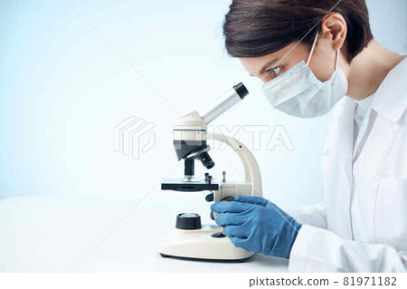 Woman in white coat microscope science work professionals Woman in white coat microscope science work professionals 81971182