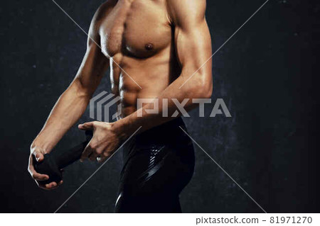 man athlete inflated body workout gym dark background man athlete inflated body workout gym dark background 81971270
