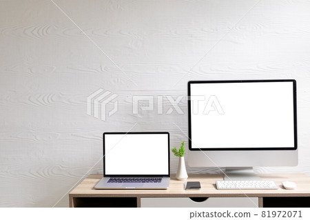 Composition of desktop computer and laptop with copy space on white background Composition of desktop computer and laptop with copy space on white background 81972071