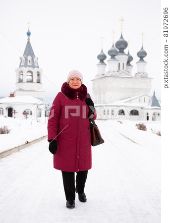 Portrait of a smiling woman on the background of the monastery in Murom 81972696