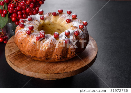 Traditional Christmas cranberry pie. Preparation of the festive table for the celebration of Christmas 81972786