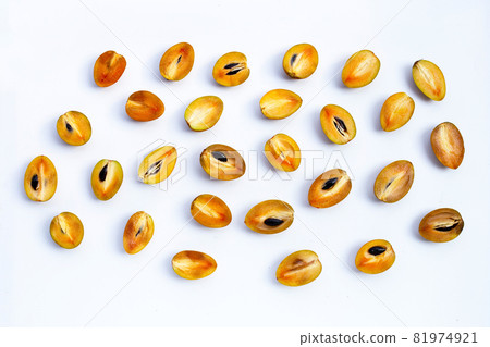Fresh half sapodilla fruit isolated on white background Fresh half sapodilla fruit isolated on white background 81974921