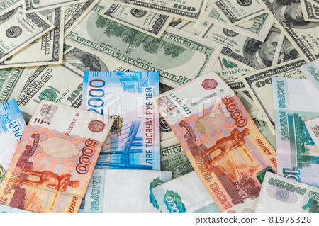 russian rubl and us dollar banknotes close-up with selective focus russian rubl and us dollar banknotes close-up with selective focus 81975328