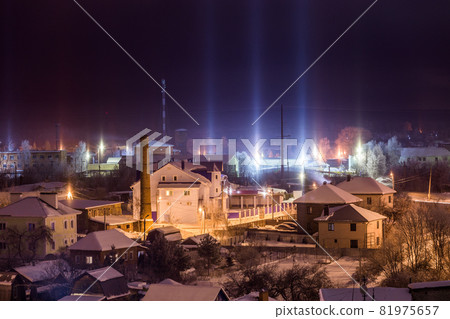 night winter cityscape with light pillars atmospheric phenomenon night winter cityscape with light pillars atmospheric phenomenon 81975657