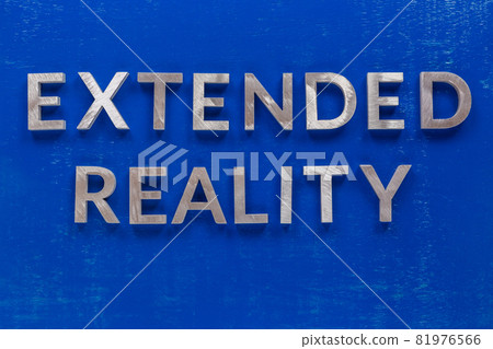 The words extended reality laid on blue painted board with thick silver metal aphabet characters. The words extended reality laid on blue painted board with thick silver metal aphabet characters. 81976566