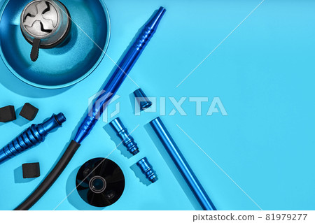 Top view of Hookah parts on light blue background Top view of Hookah parts on light blue background 81979277