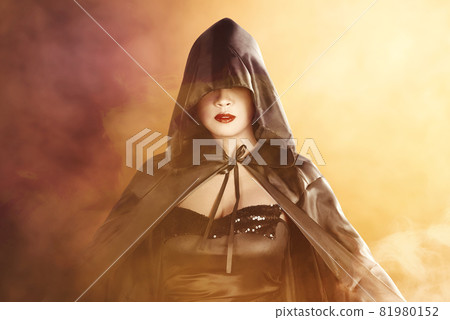 Asian witch woman with a cloak standing 81980152