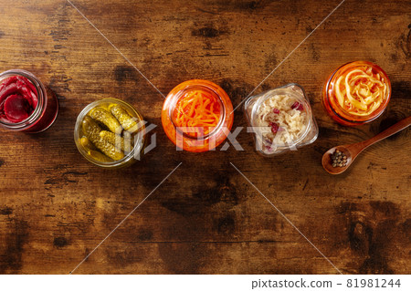 Fermented foods. A variety of pickled vegetables, shot from above 81981244