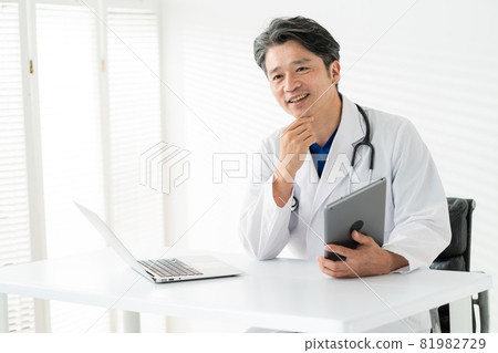 Doctor middle man white coat scrub medical examination Doctor middle man white coat scrub medical examination 81982729