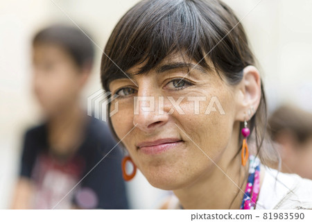 Young hispanic woman smiling happy standing at the city. 81983590