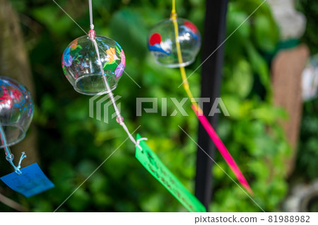 Summer tradition A cool wind chime swaying in the wind 81988982