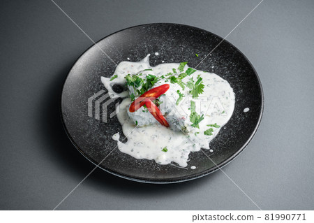 traditional georgian food gebjalia with matsoni cheese and red chili pepper 81990771
