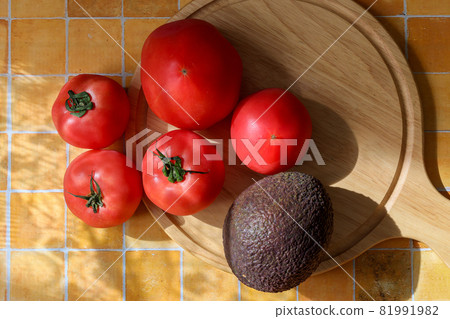 Tile pattern background avocado and tomato 81991982